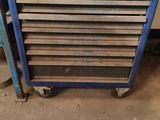 a blue tool box with a lot of tools in it