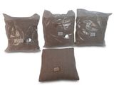 trois sacs de nourriture posés sur une surface blanche