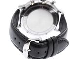 black leather strap on a watch with a white face
