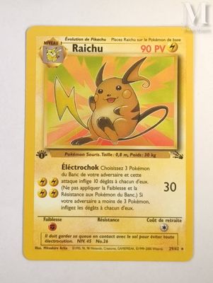 a close up of a pokemon card on a white surface