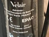 a close up of a glass pitcher with a label on it