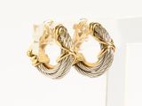two tone gold and silver twisted hoop earrings on a white background