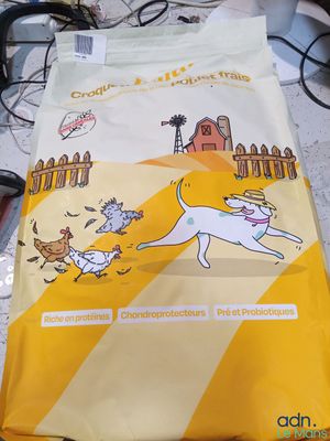 a bag of cat food sitting on a table