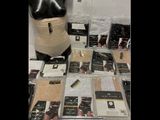 a lot of items on a table with a mannequin
