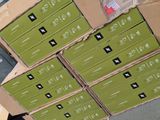 several boxes are stacked on top of each other on a table