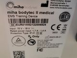 a label on the back of a machine that says mini bodytec ii medical