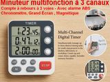 a picture of a digital timer on a wooden table