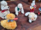 a bunch of stuffed animals that are sitting on a table