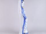 an image of a blue and white vase with a woman on it