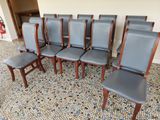 six chairs that are lined up on the floor