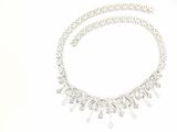 a necklace that has a lot of diamonds on it