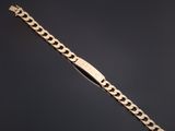 un bracelet en or 18 carats à maillons de type « curb »