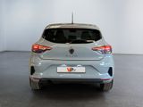 the rear end of a silver car in a showroom