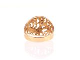a gold ring with a pink stone in it