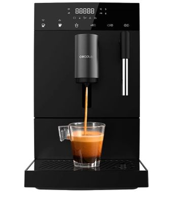 a coffee machine with a cup of coffee being poured into it