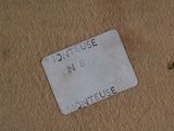 a picture of a close up of a sign on a wall
