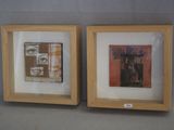deux tableaux encadrés sur le mur d'une pièce