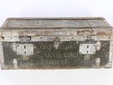 an old metal box with writing on it
