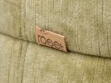 a close up of a piece of leather on a couch