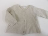 knitted cardigan sweater with buttons and buttons down the front of the cardigan