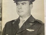 an old photo of a man in a military uniform in a book