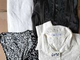 trois vêtements posés sur une boîte en carton