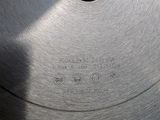 a circular saw blade that has a hole in the middle of it