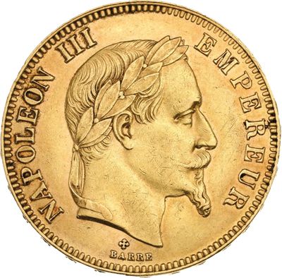 Gros plan sur une pièce d'or portant une tête d'homme