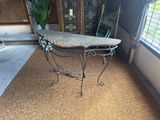 a table with a basket on top of it in a room