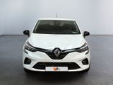 the front view of a white car in a showroom