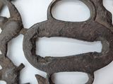 a close up of a metal object with a bird on it