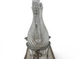 silver plated wine decanter on stand on white background