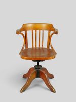 BAUMANN. Fauteuil de bureau en bois courbé.