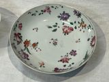 a bowl and a bowl on a table next to each other