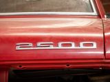 a close up of a red car with a number on it