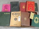 many books that are sitting in a box together