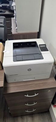 a printer that is sitting on top of a desk