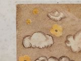 a drawing of clouds and flowers on a piece of paper