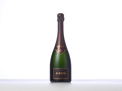 a close up of a bottle of champagne on a table