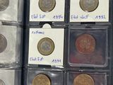 a lot of coins that are in a case