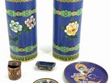 three vases that have been decorated with flowers on them