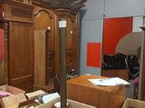a room with a lot of boxes and a lamp in it