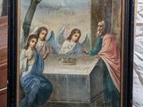painting of the last supper of jesus on a table in a church