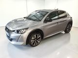 the silver car is parked in the white room