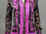 a black and pink shirt with a leopard print and pink trim