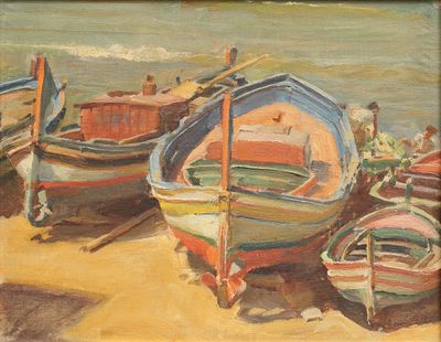 de nombreux bateaux échoués sur le sable au bord de l'eau