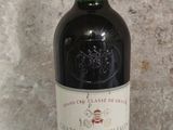 a bottle of wine that is sitting on a table