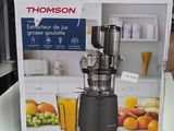une boîte sur laquelle figure l'image d'un extracteur de jus