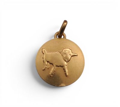 une pièce d'or sur laquelle est représenté un petit taureau