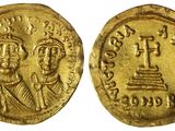 une pièce d'or portant l'image d'un homme et d'une femme